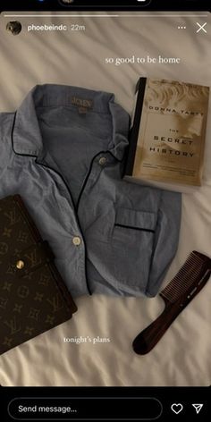 the contents of a louis vuitton shirt laid out on a bed