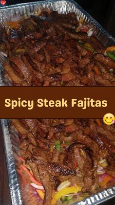 a large metal pan filled with steak fajitas on top of a wooden table