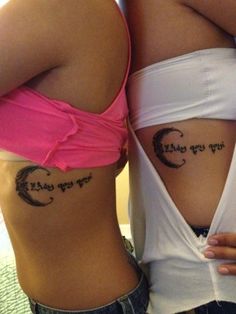 two women with tattoos on their stomachs, one has the word love written on her lower back