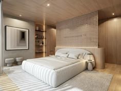 a large white bed sitting in a bedroom next to a wooden wall with shelves on it