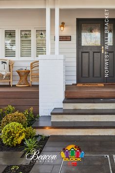 a front porch with steps leading up to the door