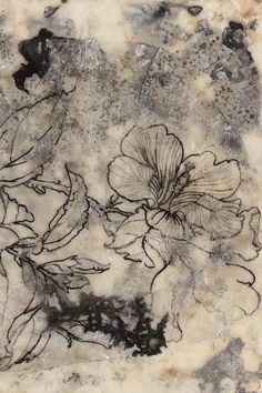 an artistic drawing of flowers on a marble slab