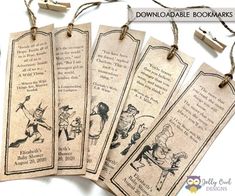 five bookmarks with cartoon characters on them are hanging from strings and decorated with string lights