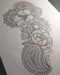 a drawing of flowers and paisleys on paper