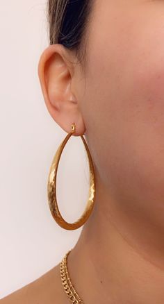 18kt Gold Filled Large Hoop Earrings Hoop Size: 58mm Width: 5mm Clasp: Hinged Product Care: To properly care for your new MaLi Beads please remember to: Apply beauty products such as perfume, hairspray or deodorant before wearing your jewelry as certain chemicals in these products may damage the finish. Always remove your jewelry before swimming, doing household chores or using abrasive cleaners. Hoop Earrings Large, Earrings Everyday, Hammered Gold, Alessandra Ambrosio, Vanessa Hudgens, Gold Filled Earrings, Earrings Minimalist, Large Hoop Earrings, Jessica Alba