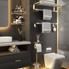 a modern bathroom with toilet, sink and towel rack in it's display area