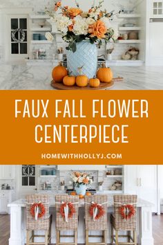 an orange and white fall centerpiece with pumpkins on the table in front of it