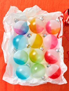 a bunch of christmas ornaments sitting on top of a table