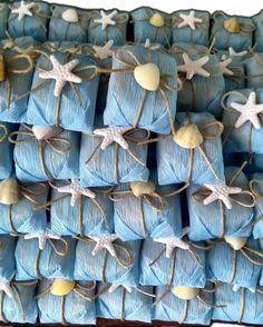 blue wrapped presents with starfish and seashells on them