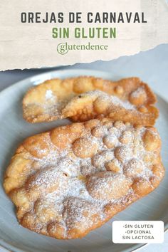 two desserts are on a plate with powdered sugar and the title reads, orejas de caranaval sin gluten