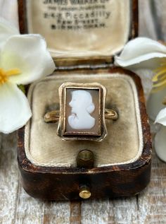 A lovely vintage cameo ring crafted in 9 carat solid yellow gold hallmarked in London in 1966.  This wonderful ring features a carved portrait of a lady set in a yellow gold bezel which provides a nice contrast and enhances the details of the carving.  The elegant rectangular shape of the cameo provides a timeless and sophisticated look leading to a sturdy plain polished shank.  It looks wonderful on the finger and has a nice solid heavy feel. In good vintage condition with light wear.  The came Vintage 14k Gold Cameo Rings, Classic Oval Cameo Rings, Victorian Cameo Rings For Anniversary, Victorian Gold Cameo Rings, Cameo 14k Gold Rings For Collectors, Antique Cameo Signet Ring For Weddings, Cameo 14k Gold Rings For Anniversary, Gold Cameo Signet Ring Collectible, Collectible 14k Gold Cameo Rings