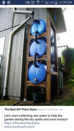 an outdoor water storage system made out of barrels