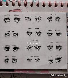 a bunch of eyes drawn on top of a piece of paper