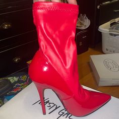 Brand New Never Worn Comes In Box Red Ankle-high Heels For Night Out, Red Ankle-high Heels, Red High Ankle Heels For Party, Trendy Red Boots For Evening, Trendy Red Evening Boots, Red Synthetic Boots, Fitted Red Synthetic Boots, Red Fitted Synthetic Boots, Red Ankle Boot Heels For Night Out