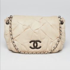 Authentic Chanel Ivory Quilted Iridescent Pleated Leather Crossbody Messenger Bag Condition Is Good, Some Normal Wear, Some Soiling Around, Moderate Wear On Strap. Always Authentic!!! Material: Calfskin Leather Color:Ivory Beige Includes: Chanel Dust Bag, Booklets, And Authenticity Card Origin: Italy Production Year: 2011 Date/Authenticity Code: 144xxxxx Measurements: 11" L X 2.5" W X 8" H Interior Pockets: One Zip Pocket Handles: Single Leather And Chain Entwined Strap Handle Drop: 20" Closure/ Chanel Mini Rectangular, Classic Flap Bag, Blue Wallet, Chanel Mini, Chanel Purse, Pink Chanel, Heart Bag, Leather Handbags Crossbody, Chanel Wallet