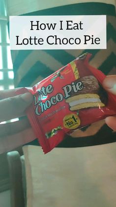 a person holding up a bag of chocolate pie in their hand with the text how i eat lotte choco pie