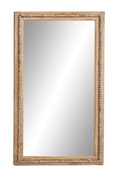 a wooden framed mirror on a white wall