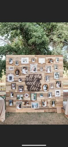 a wooden wall with pictures on it that says all you need is love