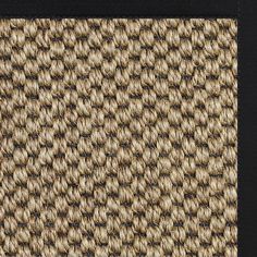 close up view of woven material with black border on white background for use in interior design