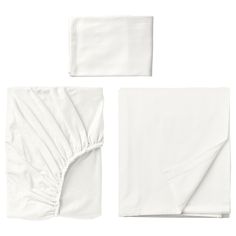 white sheets and napkins laid out on top of each other