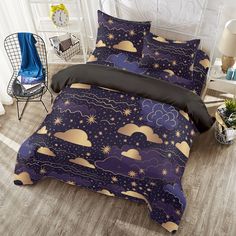 a bed room with a neatly made bed and two night sky bedspread sets