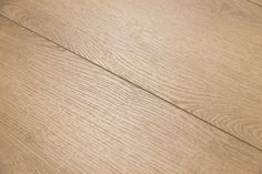 an image of wood flooring that looks like it has been painted in light brown