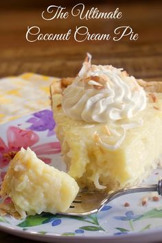 A slice of coconut cream pie topped with a dollop of whipped cream and toasted coconut.