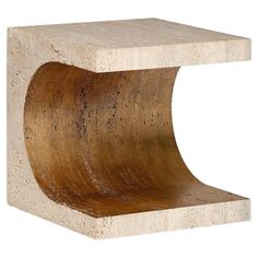 a wooden table with a curved design on it