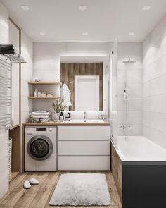 a white bathroom with a washer and dryer next to a bathtub in the corner