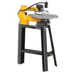 a table sawing machine sitting on top of a stool