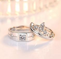 two white gold wedding rings with diamond accents