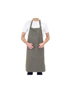 a man wearing an apron with his hands on his hips