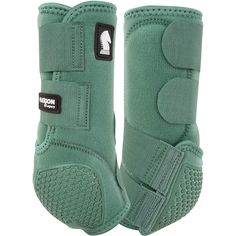 a pair of green equestrian boots