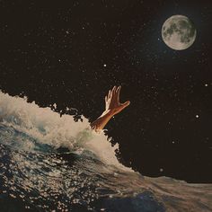 a hand reaching out from the water to catch a wave with a full moon in the background