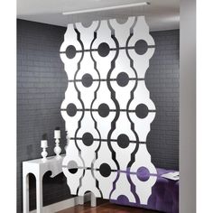 a room with a white and black wall covering