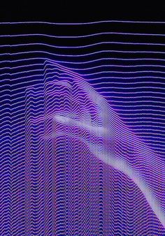 an abstract background with lines and curves in blue, purple and pink colors on a black background