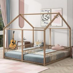 a child's bedroom with a wooden house bed