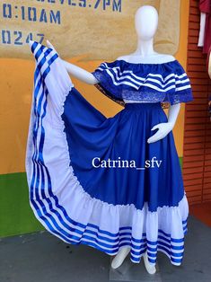 Skirt suit and blouse in white and blue king with white and blue slats perfect for any patriotic event the material is poplin polyester and cotton the suits are size small the skirt measures90 cm long, medium slat the skirt measures 90 centimeters and the large measures 100 cm from the waist to below one meter long the skirts fit wide either size girl to the size large El Salvador Culture Clothes, El Salvador Dress, Hispanic Dresses, Skirt And Blouse Outfit, Folklorico Dresses, Folkloric Dress, Dress Vector, North Hills, Mexican Fashion