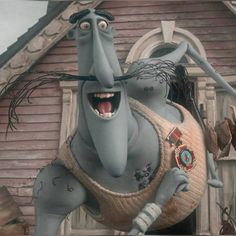 an animated character is standing in front of a house with his mouth open and tongue out