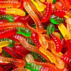 gummy bears are colorfully colored and they look like jellybeons or caterpillars