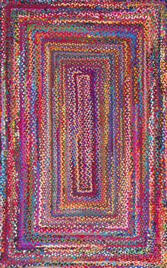 the multicolored rug is made from yarn