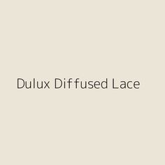 the words dulux diffused lace are black and white