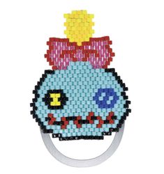 a beaded purse with a bow on it's head and an object made out of beads