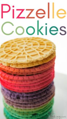 a stack of colorful waffle cookies sitting on top of a white plate with text overlay