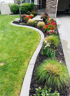 the front yard is clean and ready to be used as a flower bed for landscaping