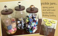 three jars filled with different types of crafting items on top of a wooden table