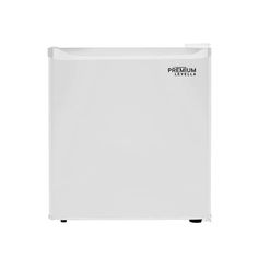 a white refrigerator freezer sitting on top of a white counter next to a wall