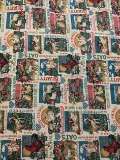 the fabric is very colorful and has many different pictures on it, including animals in red, white, and blue