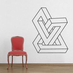 a red chair sitting in front of a white wall with a geometric design on it