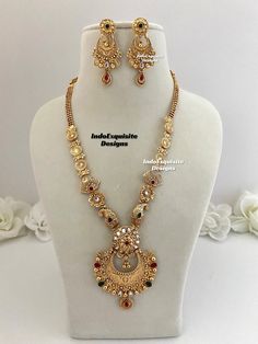 Matt gold finish Raani Haar(long necklace) comes with Earrings/bridal jewellery/south Indian long necklace Set/Rajwadi Rani Haar/Guttapusalu necklace/ one 1 gram gold/Ruby Green  All items are shipped from Brampton, Ontario, Canada. If you need your item by a certain day, please reach out to us for express delivery option before placing the order so that we can update the shipping for you. Standard shipping/delivery timeline Below are the estimated delivery times after the order is shipped/dispatched.  ---> USA delivery timeline * 3-5  business days to major urban centers in USA. It may take 2-3 days extra to remote locations ---> Canada delivery timeline  * 2-3 business days - GTA  & Montreal  * 2-4  business days - Rest of Ontario/Quebec * 4-6 business days-  Rest of Canada (Please consi Luxury Brass Temple Jewelry Necklace, Luxury Gold Temple Necklace With Cutdana, Luxury Long Necklace For Diwali, Luxury Yellow Gold Temple Necklace For Diwali, Traditional Luxury Brass Temple Necklace, Luxury Gold Bollywood Mala, Rajwadi Jewellery, Jewellery South Indian, Kundan Long Necklace